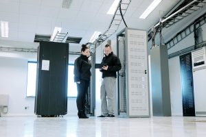 2 engineers doing a site survey and audit