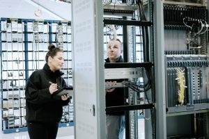 2 Indigo engineers at a data centre