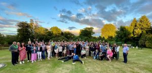 A large group of Indigo people outdoors
