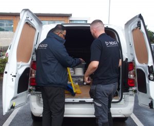 Indigo engineers checking equipment