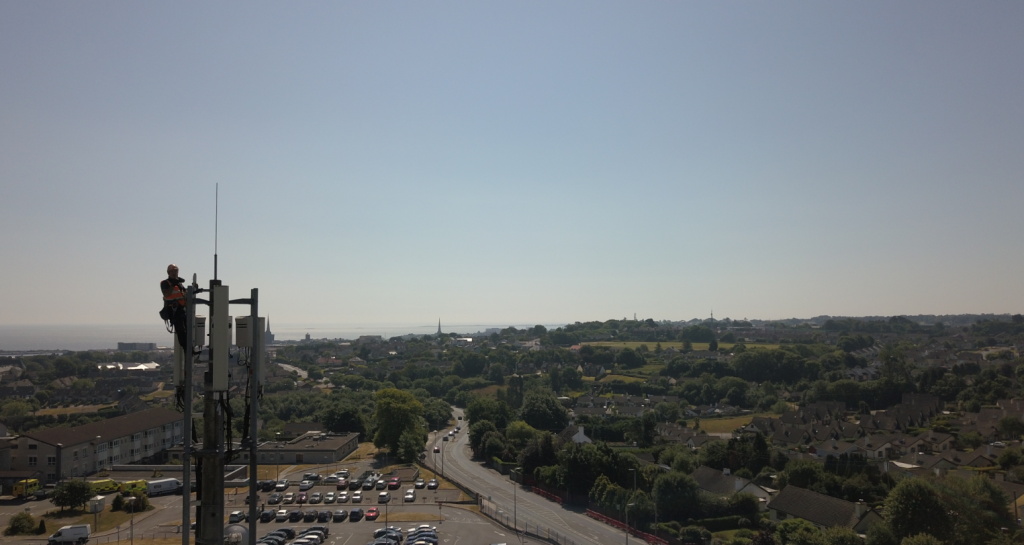 Arial view of an engineer on a mobile tower