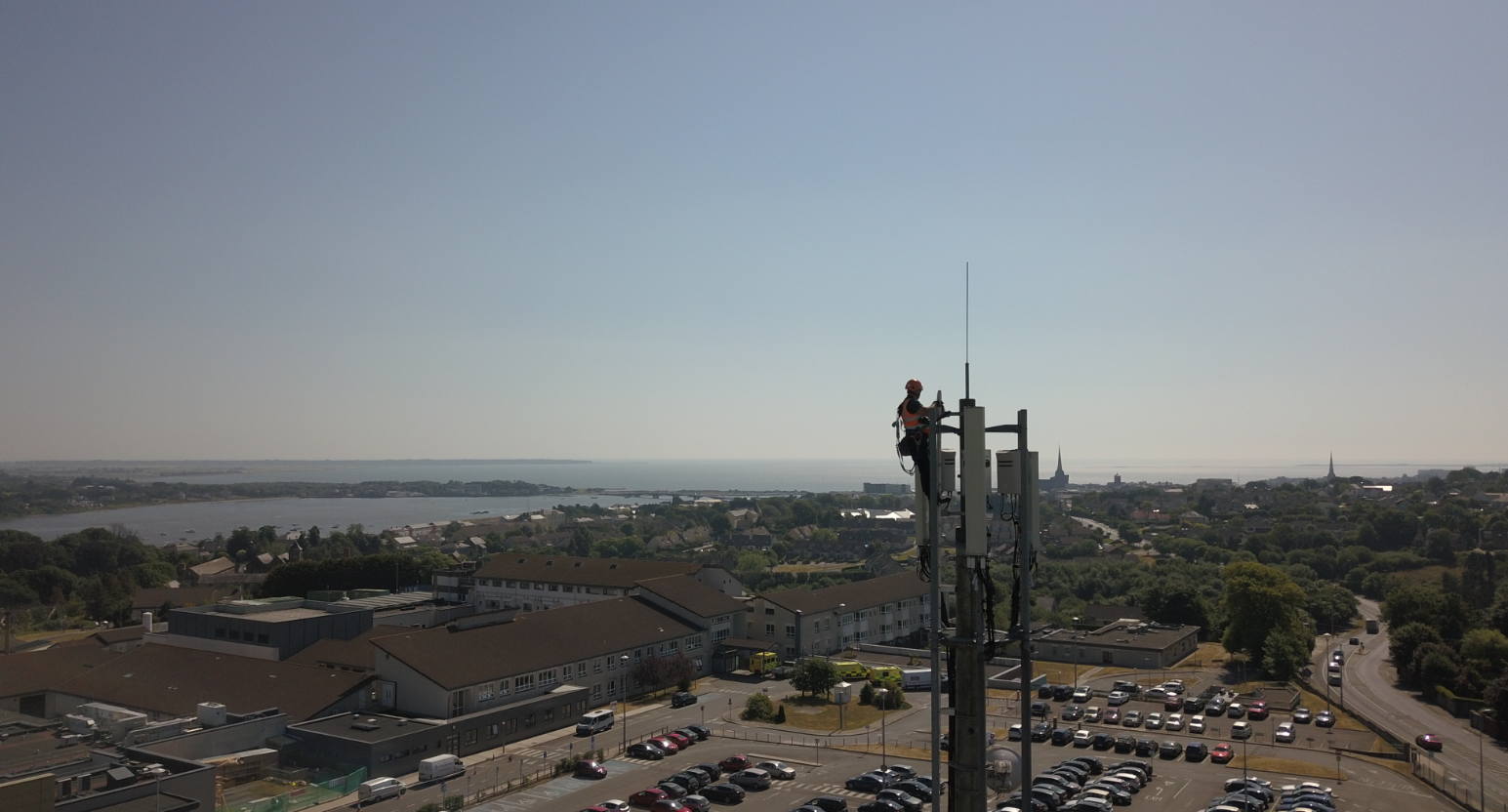 Engineer up a mobile tower with 5G equipment